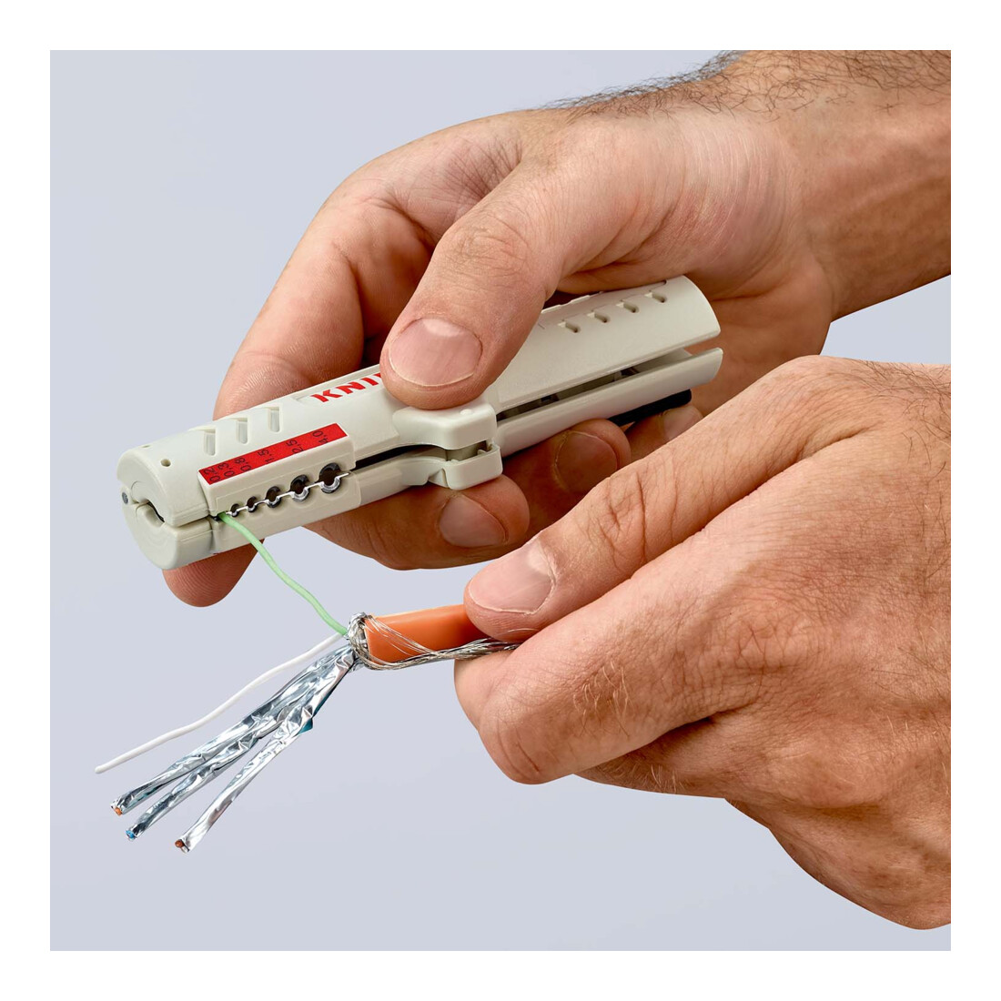 Outil à dégainer pour câbles de données Knipex